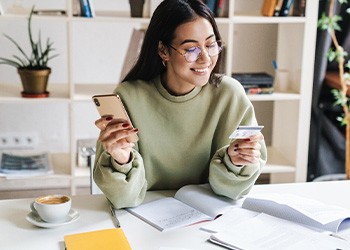 Woman using a credit card